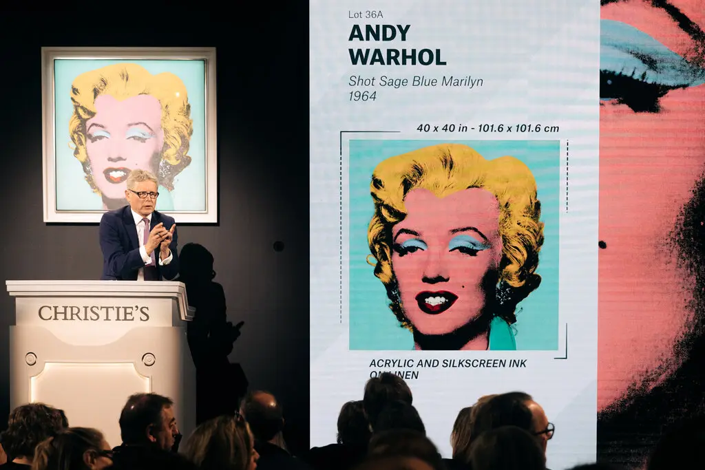 Andy Warhol, Shot Sage Blue Marilyn, 1964, Christie's'de satıldığı açık arttırmadan bir kesit, Fotoğraf: Andy Warhol Foundation / the Visual Arts, Inc./Artists Rights Society (ARS), NY; The New York Times/ Jeenah Moon